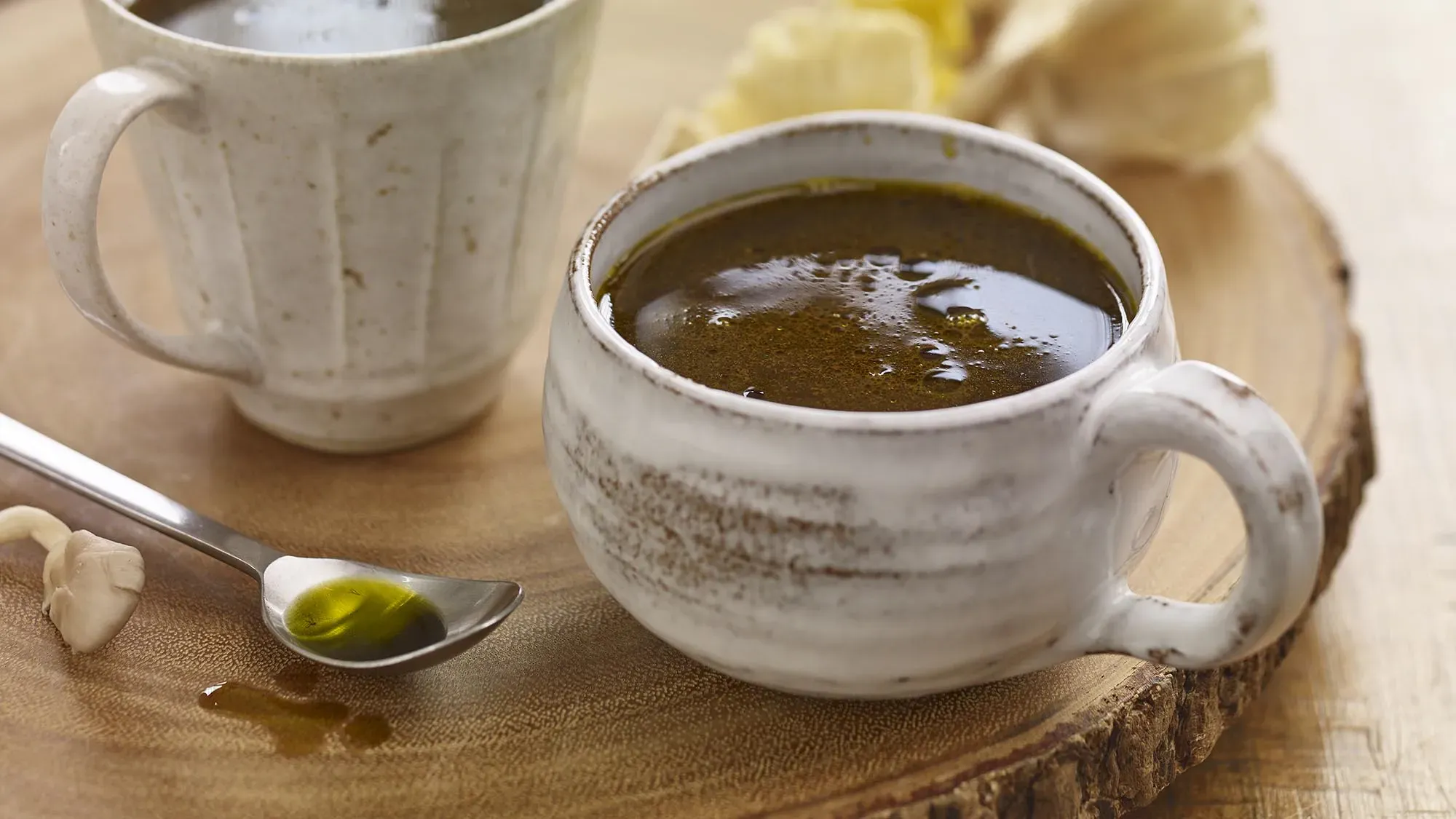 HERBED MUSHROOM SIPPING BROTH WITH AVOCADO OIL DRIZZLE